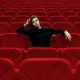 woman sitting in theater