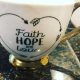 tea cup reading faith, hope and joy